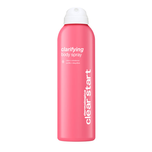 A pink aerosol can of Dermalogica clarifying body spray with a white cap and text—designed to target body breakouts using salicylic acid.