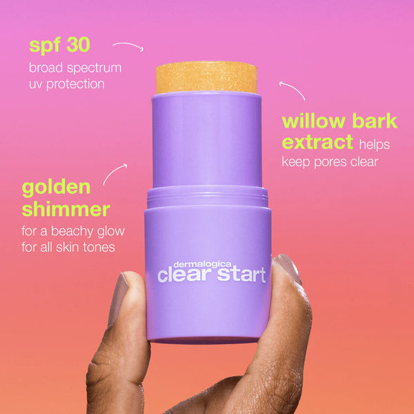A hand holds a golden hour hydrating spf30 stick by Dermalogica South Africa with yellow product inside. Text highlights non-comedogenic SPF30, golden shimmer, and willow bark extract benefits against a pink-orange gradient background.