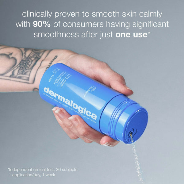 A tattooed hand pours oat-based exfoliant from a blue Dermalogica hydration on-the-go set (3 travel size). Text claims 90% saw smoother skin after one use, based on a one-week clinical test with 30 participants.