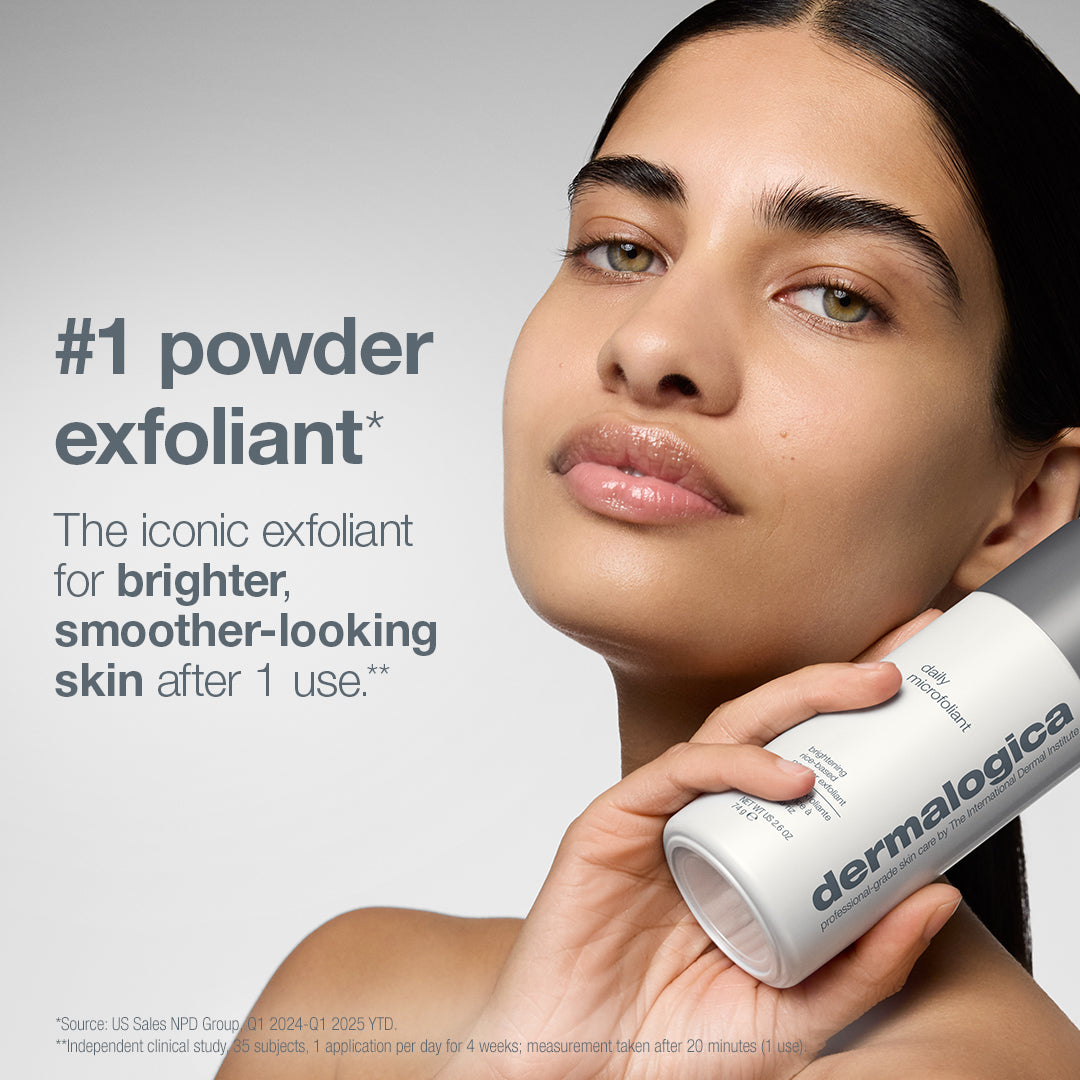 A woman holds a bottle of Daily Microfoliant from the pro ritual: exfoliate + glow set, next to text reading #1 powder exfoliant and The iconic exfoliant for brighter, glowing skin after 1 use.
