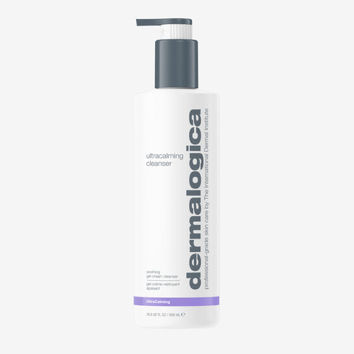 A 500 ml white pump bottle of Dermalogica ultracalming cleanser, with black and gray text, a purple accent near the base, and a gray dispenser. This non-foaming cleanser is ideal for sensitive skin.
