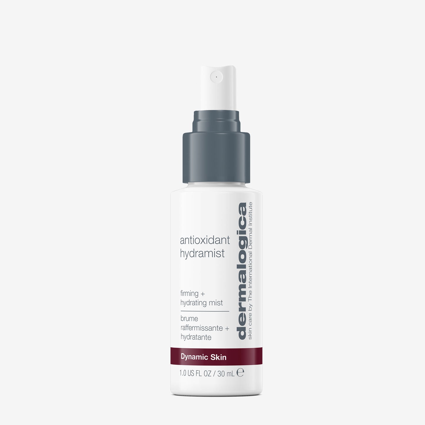 A white spray bottle of Dermalogica antioxidant hydramist, an antioxidant toner for firm, hydrated skin, with a gray pump and cap. 1.0 fl oz (30 ml), text emphasizes hydrating and firming benefits; shown on a white background.