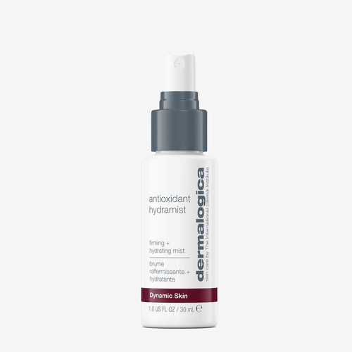A white spray bottle of Dermalogica antioxidant hydramist, an antioxidant toner for firm, hydrated skin, with a gray pump and cap. 1.0 fl oz (30 ml), text emphasizes hydrating and firming benefits; shown on a white background.