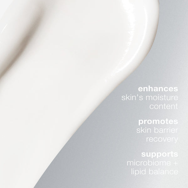 A creamy white swatch of Dermalogica’s intensive moisture balance on a gradient gray background, with text: boosts skin’s moisture, helps barrier recovery, and supports microbiome and lipid balance.