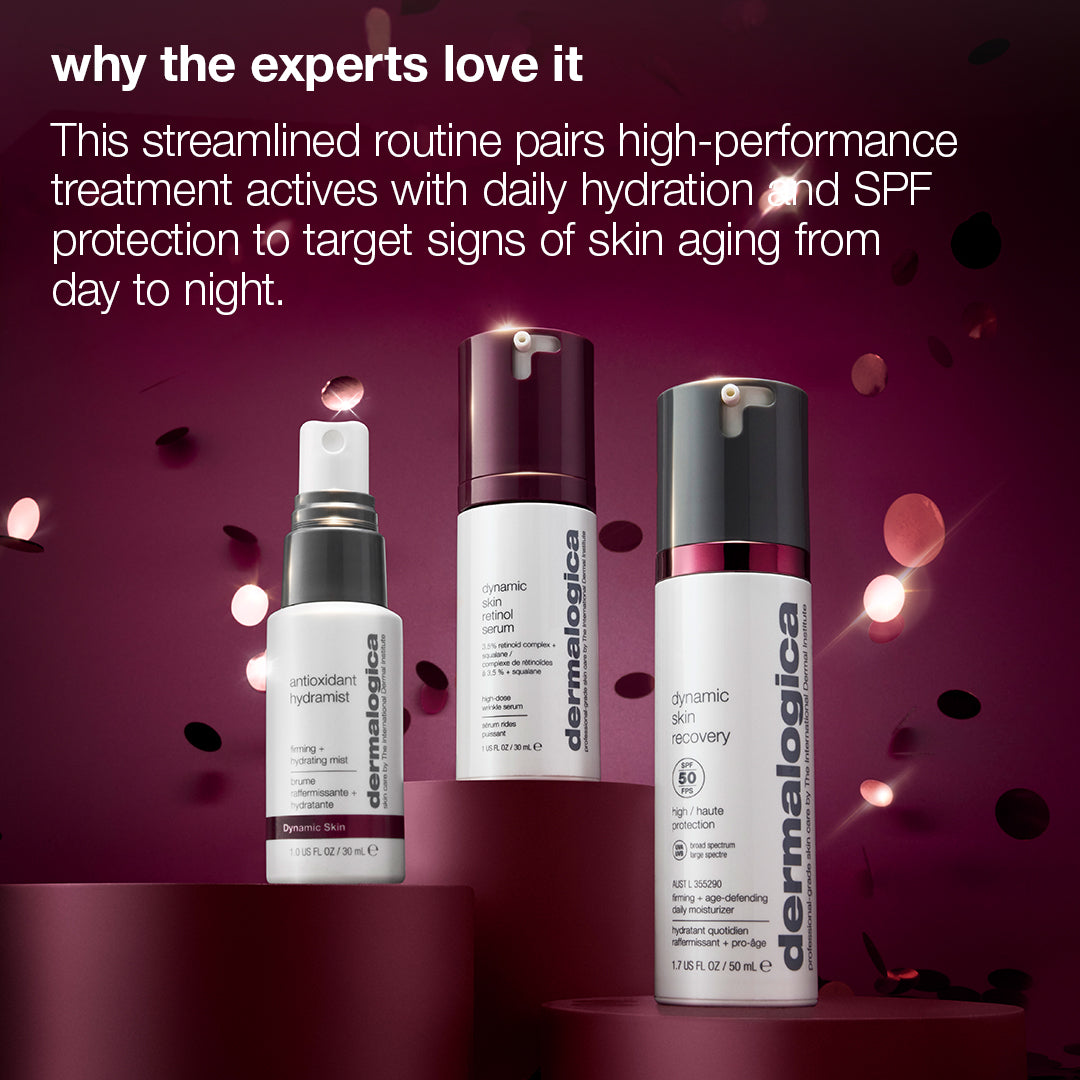 Three skincare bottles from the expert protect + renew set (2 full-size + 1 travel), including a hydrating mist, retinol serum, and SPF 50 moisturizer, stand on cylindrical pedestals against a dark background.