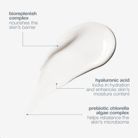 A white tube of Dermalogica intensive moisture balance moisturizer with a gray cap stands upright on a white background. The front displays the brand and product name, emphasizing skin barrier support and optimal lipid balance.