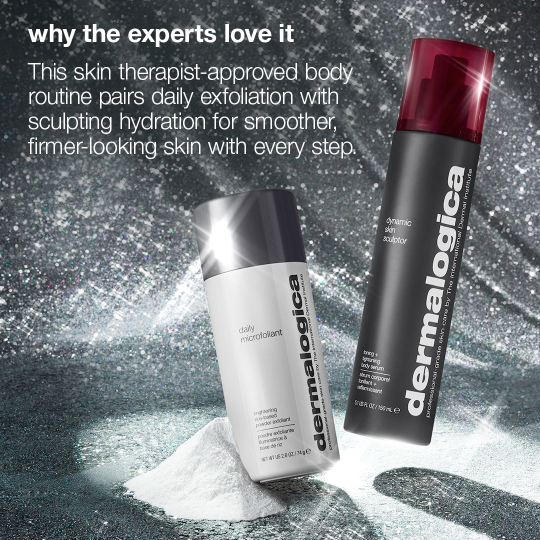 A white cylindrical body exfoliant and a tall, dark firming serum with a red cap from the body reset set (2 full-size) by Dermalogica South Africa sit atop a pile of white powder, with text overhead describing them as a body routine.
