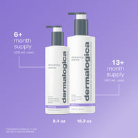 A 250 mL (8.4 fl oz) white and gray Dermalogica ultracalming cleanser bottle with purple accents, a gentle pH-balanced gel-cream for sensitive skin that soothes as it cleanses.