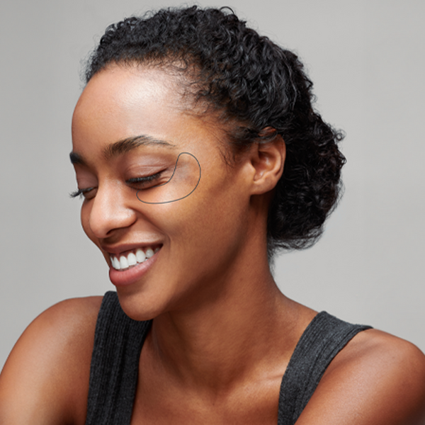 Behind the brown spot