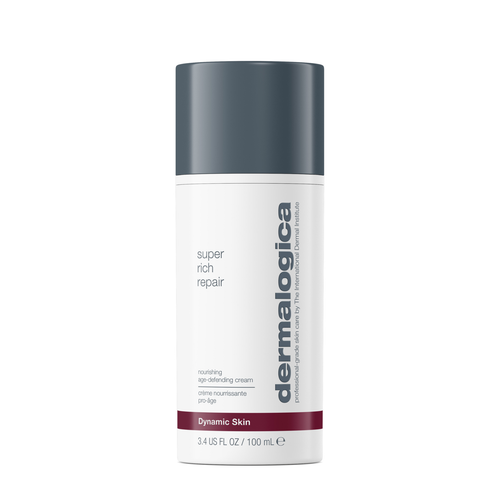 A white and gray 100 mL bottle of Dermalogica super rich repair, an age-redefining dry skin treatment cream, features a red stripe at the bottom.