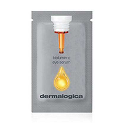 A sample sachet of Dermalogica biolumin-c eye serum sample, showing an illustration of a dropper with a yellow serum droplet, and the product name and Dermalogica brand on the silver-gray packaging.