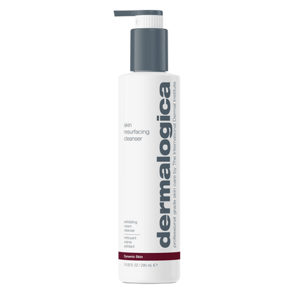A white bottle of Dermalogica Skin Resurfacing Cleanser featuring a gray pump and red and gray text, labeled as an exfoliating cleanser with lactic acid for professional-grade skincare, specifically formulated to address aging skin.