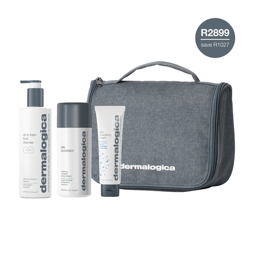 Dermalogica South Africa’s men’s daily face + body skin care kit includes three essentials: an oil to foam cleanser, a daily microfoliant exfoliant, and a moisturizer, all organized in a sleek gray travel bag. A circular label highlights the value: R2899 save R1027.