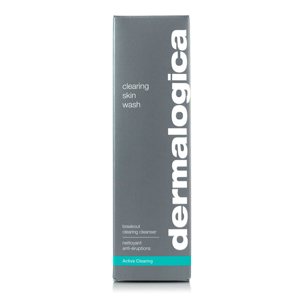 A tall, rectangular grey Dermalogica Clearing Skin Wash box with white and teal text describes this foaming salicylic acid cleanser from the Active Clearing range, formulated to help prevent breakouts.