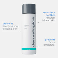 A white Dermalogica clearing skin wash bottle with a gray cap and teal accent band displays the brand name in large gray letters. This foaming cleanser contains salicylic acid to help clear and prevent breakouts.