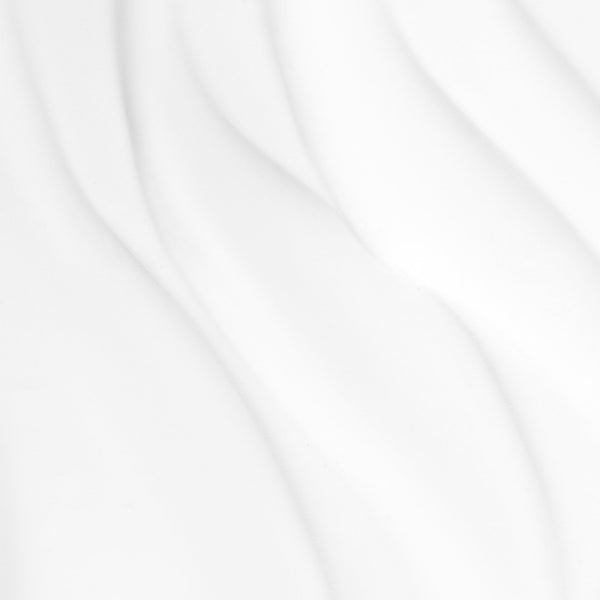 With a smooth white surface and subtle, flowing lines, the design of Dermalogica's Intensive Moisture Cleanser evokes the gentle hydration it delivers, while minimalistic curves and light shadows create a serene, modern look.