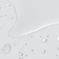 A bottle of Dermalogica retinol clearing oil stands upright on a white background, featuring a gradient turquoise design, white cap, and Active Clearing label. Formulated with retinol and salicylic acid.